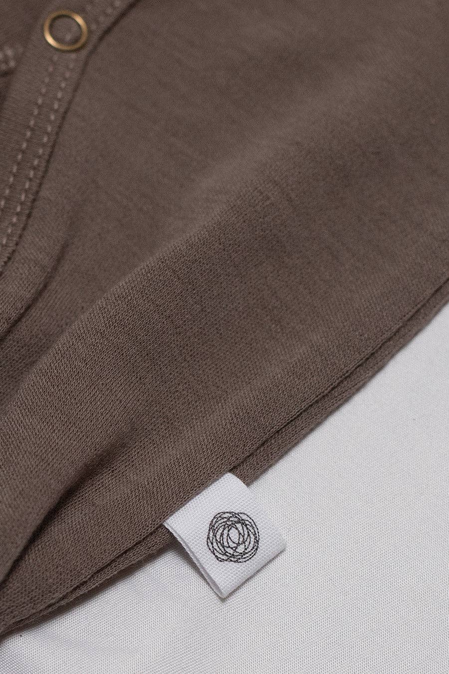 Wollen babypakje / playsuit 100% Merinowol - Walnut 50/ 56 🫧