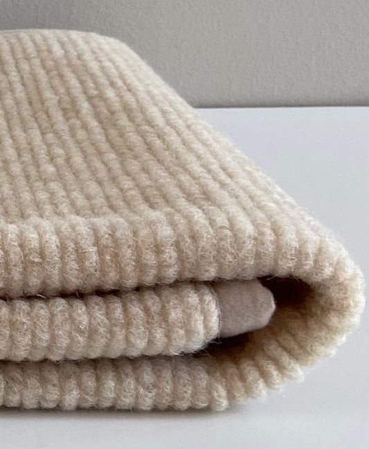 Onderlegger ledikant Ribstructuur - 100% Merinowol 🫧